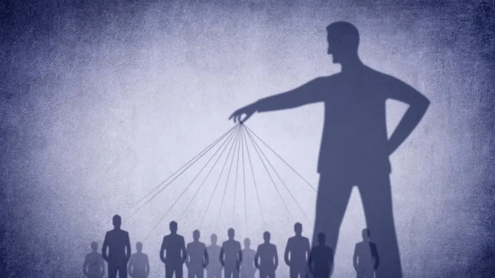 Person holding people upwith strings